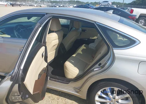 2013 Toyota Avalon Limited z USA, uszkodzony, nr VIN 4T1BK1EB7DU057275